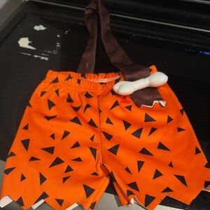 Kids Orange Cave-Style Halloween Shorts with Brown Bone Accent